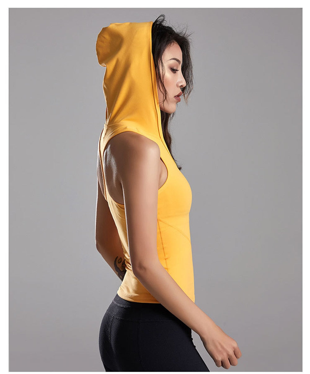 Top sport sans manches zip et capuche coloris au choix