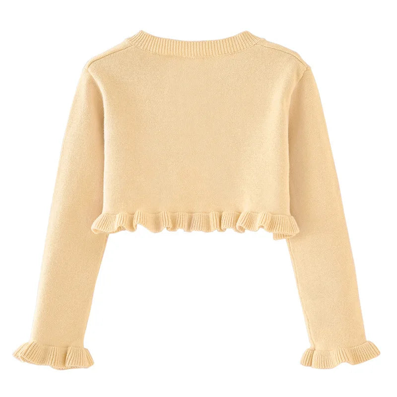 Veste courte manches longues avec bouton